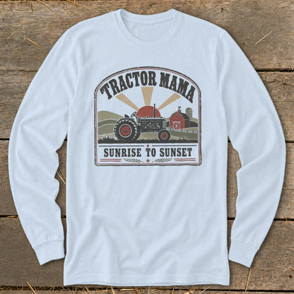 Tractor Mama Sunrise to Sunset graphic on white long-sleeve shirt.