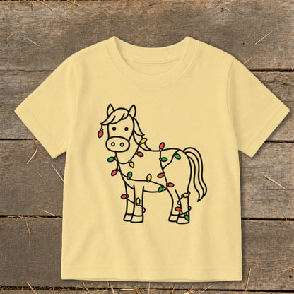 Children's yellow t-shirt with a cartoon horse wrapped in Christmas lights.
