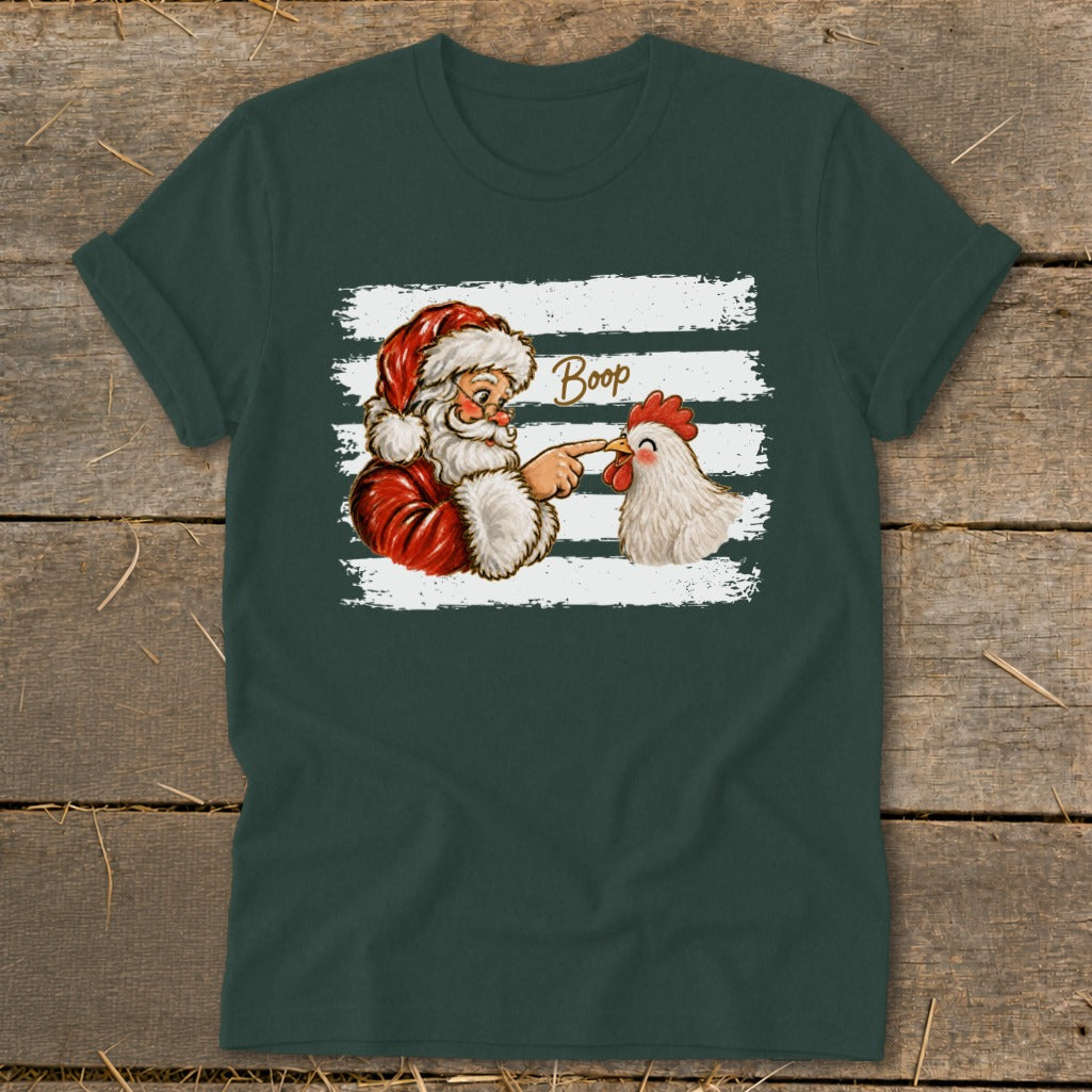 Santa booping a chicken with the word "Boop" above it on a dark green shirt.