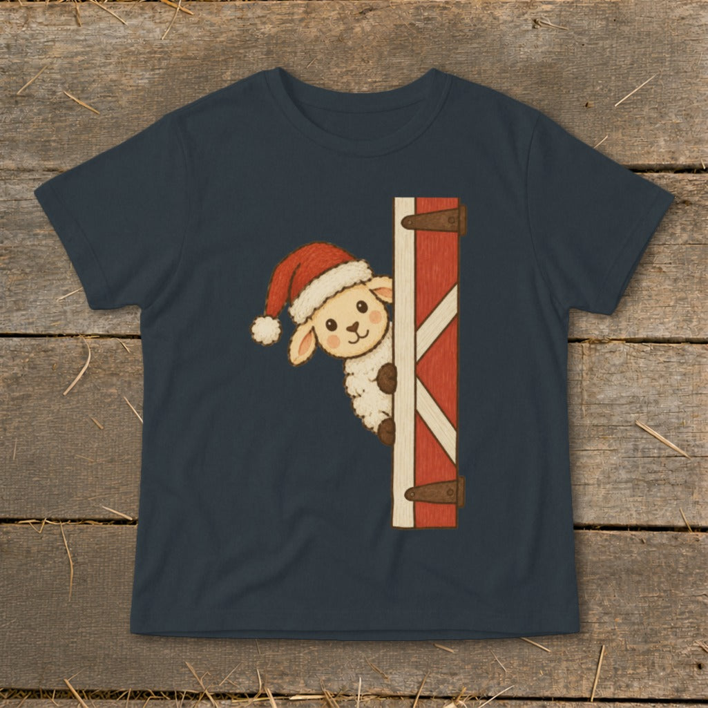 Dark blue t-shirt with a cartoon sheep wearing a Santa hat peeking from behind a barn door.