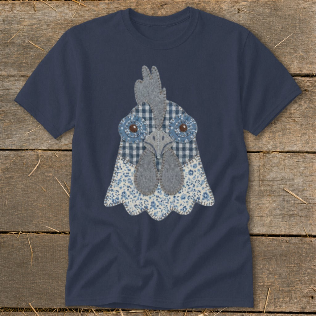 Navy t-shirt with a fabric applique of a blue and white patterned chicken face.