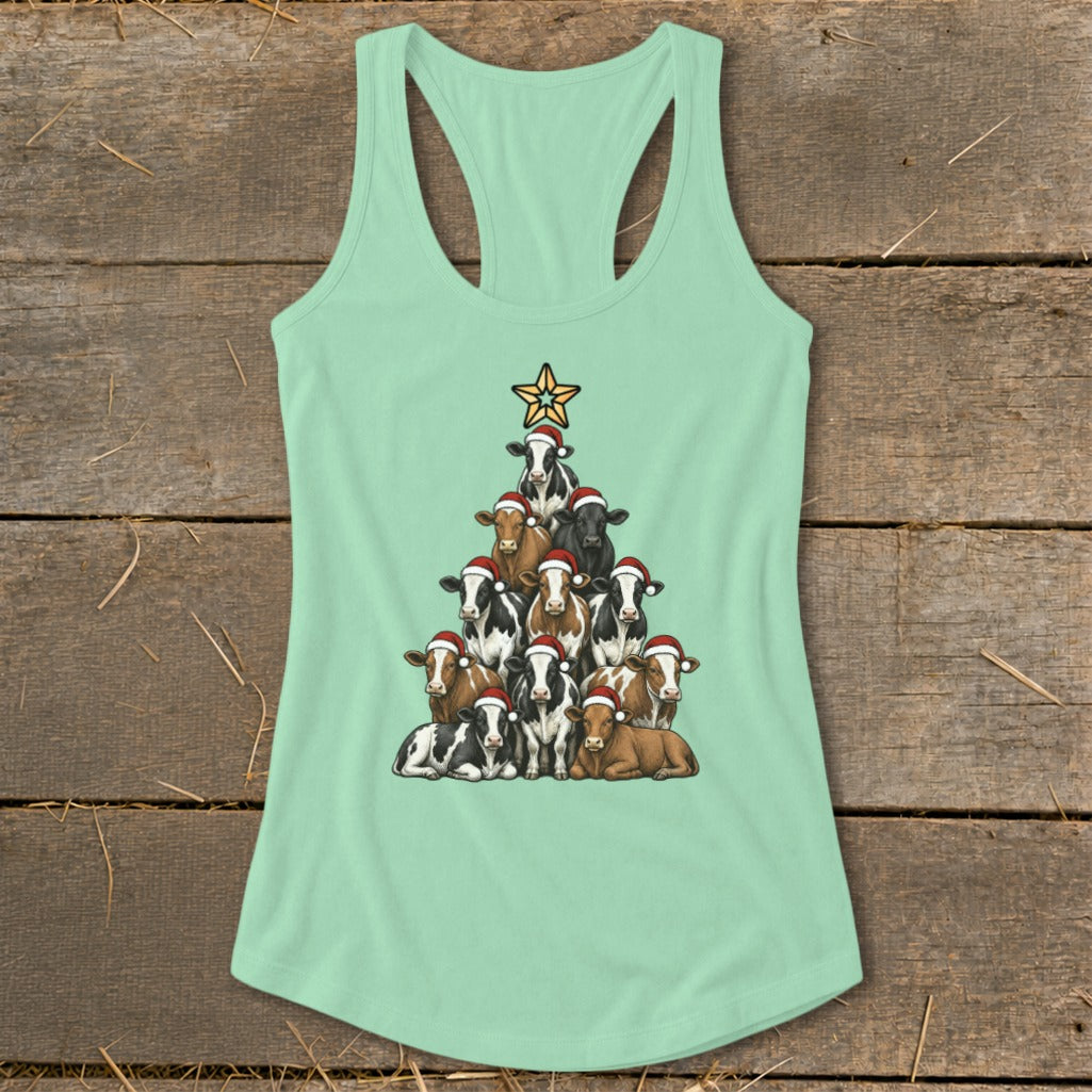 Mint green tank top with a Christmas tree made of cows wearing Santa hats.