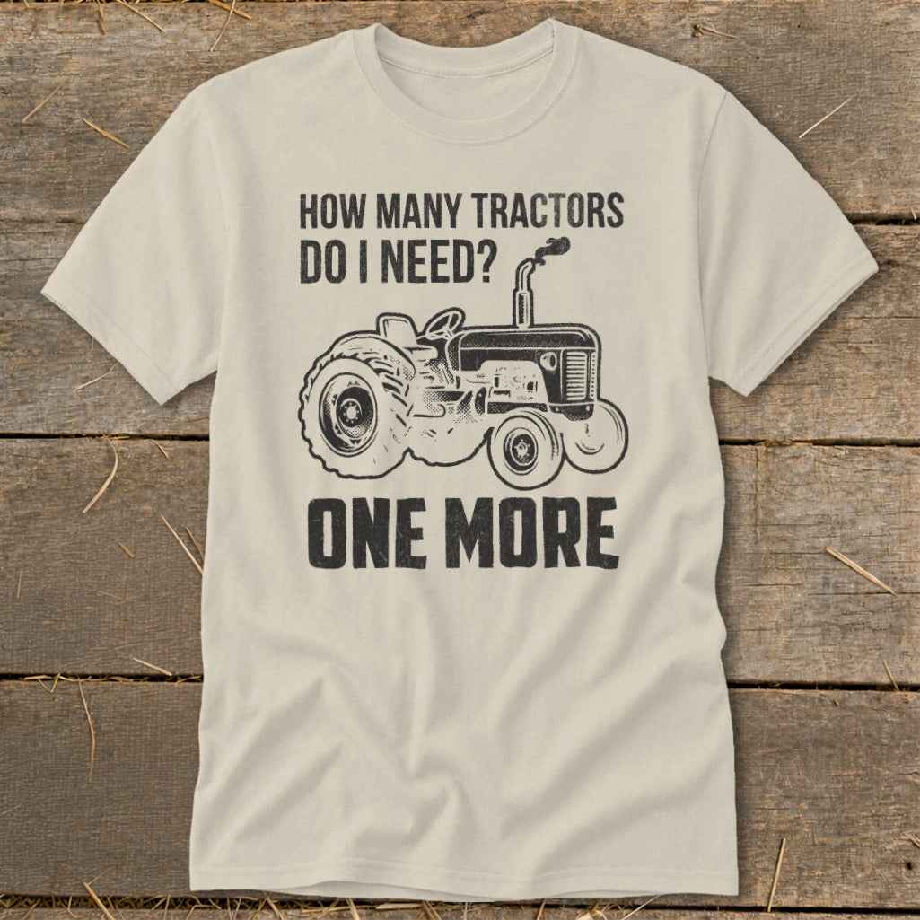 T-shirt with drawing of tractor and text "HOW MANY TRACTORS DO I NEED? ONE MORE".