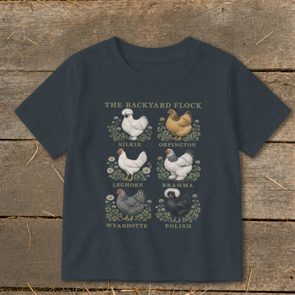 "The Backyard Flock" t-shirt with six chicken illustrations: Silkie, Orpington, Leghorn, Brahma, Wyandotte, and Polish.