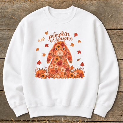 White sweatshirt with a floral bunny, pumpkins, and "pumpkin season" text.