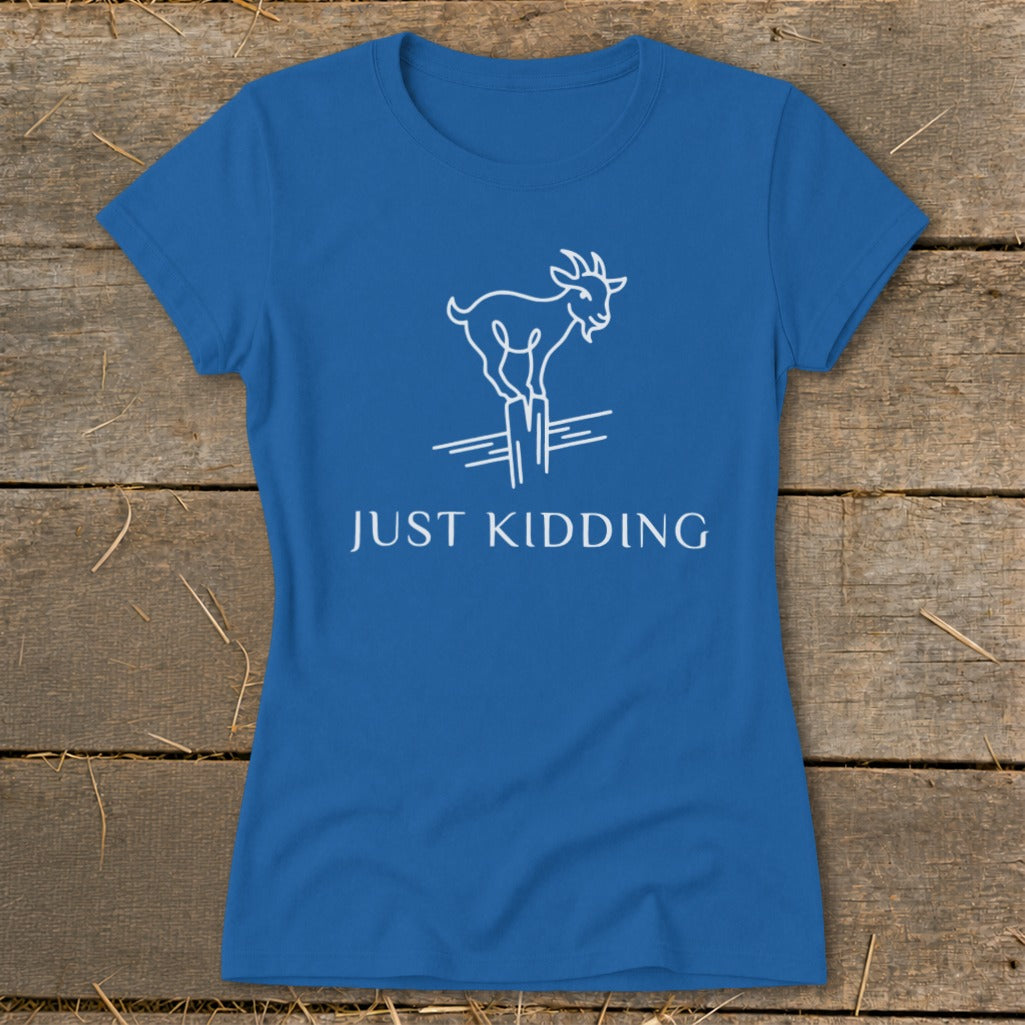Blue t-shirt with white line drawing of a goat standing on posts and text "JUST KIDDING".