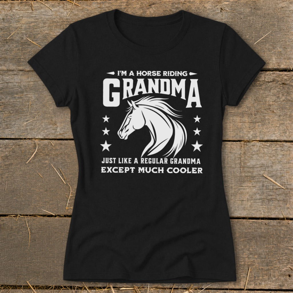 Black t-shirt with white text and horse graphic: "I'm a horse riding Grandma. Just like a regular grandma except much cooler."