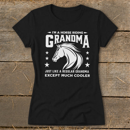 Black t-shirt with white text and horse graphic: "I'm a horse riding Grandma. Just like a regular grandma except much cooler."