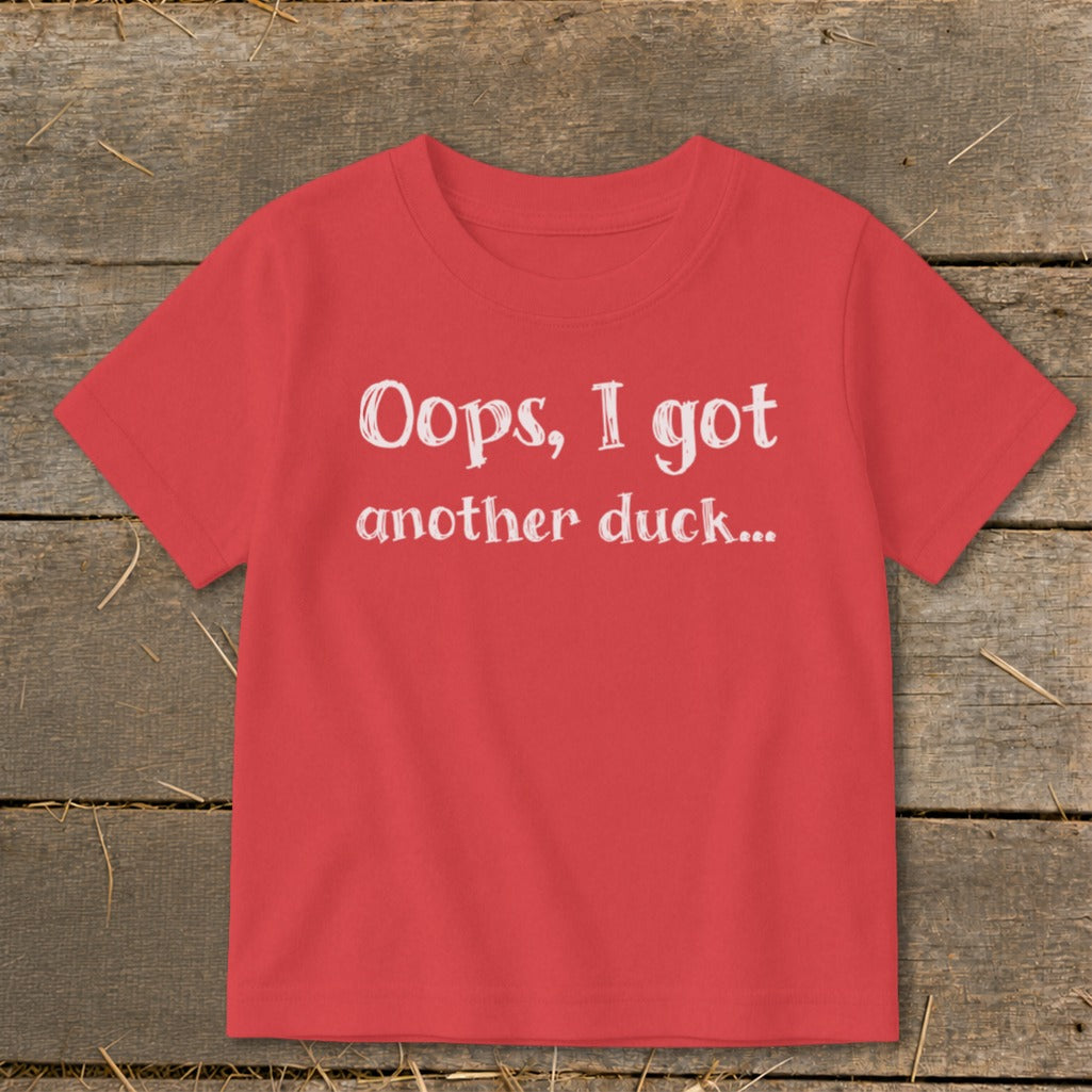 Red t-shirt with white text "Oops, I got another duck..."