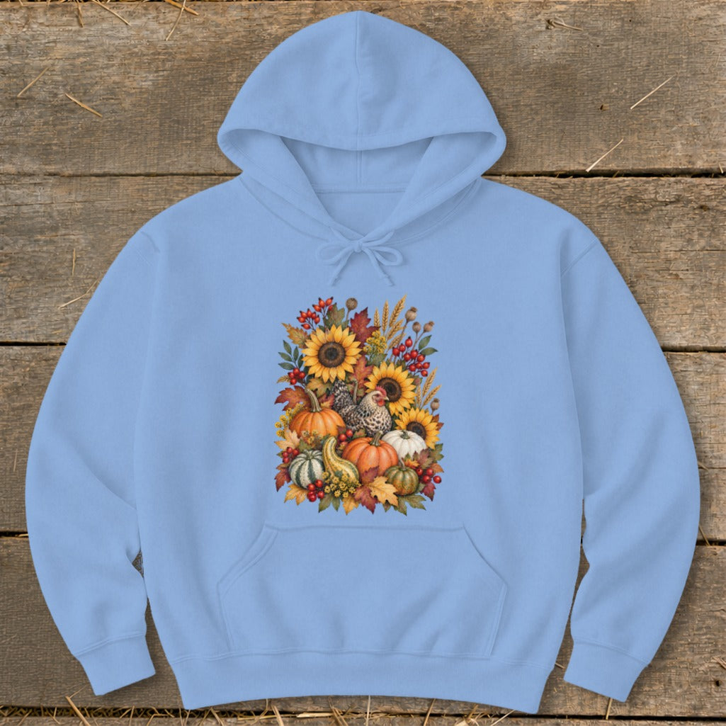 Light blue hoodie with a floral arrangement of sunflowers, pumpkins, and chickens.