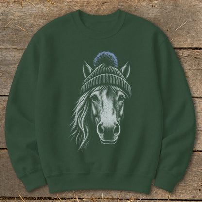 Green sweatshirt featuring a horse wearing a knitted hat and pom-pom.