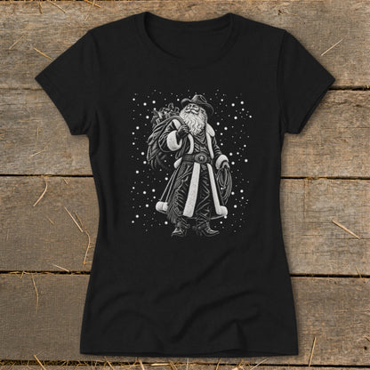 Black t-shirt with a western-themed Santa Claus graphic carrying a sack and lasso.
