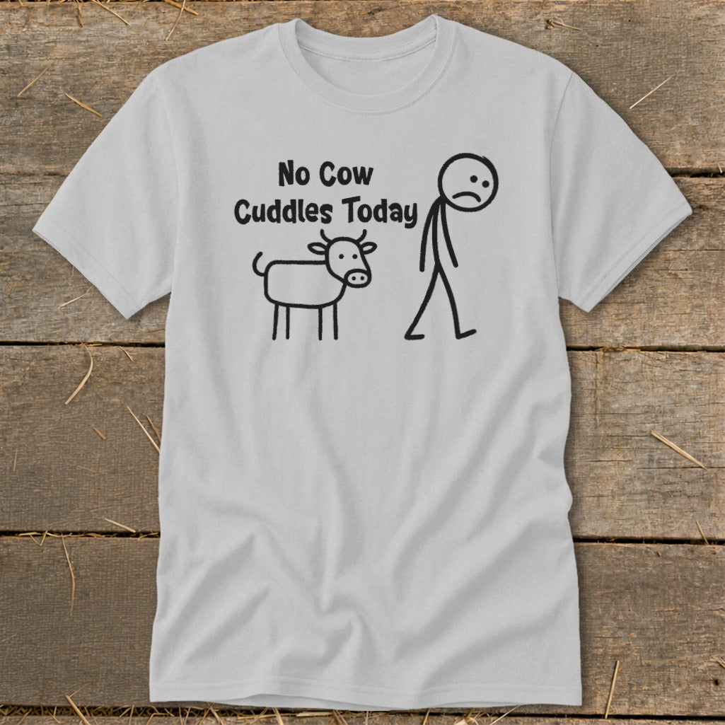 Light grey t-shirt with black graphic of a stick figure walking away from a sad cow, text reads "No Cow Cuddles Today."
