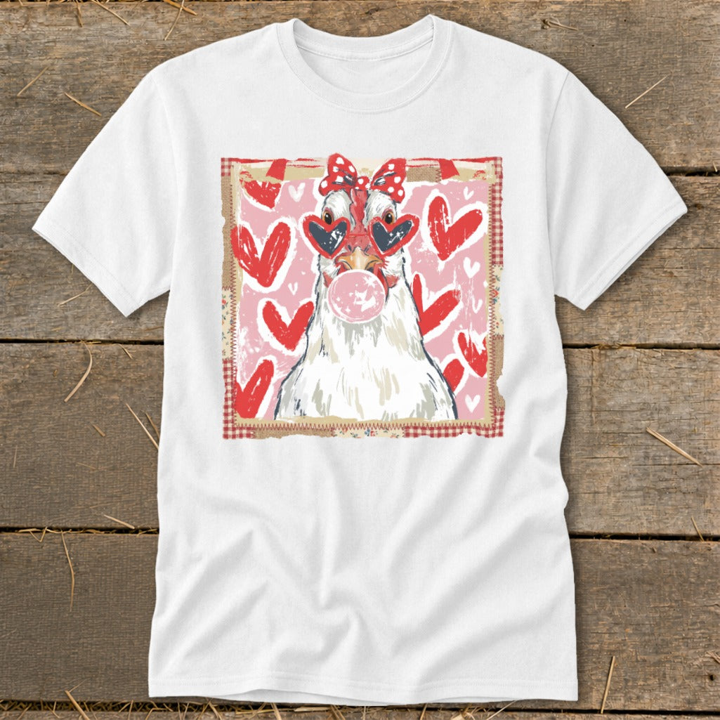 White t-shirt with graphic of a chicken wearing heart sunglasses and chewing bubblegum.