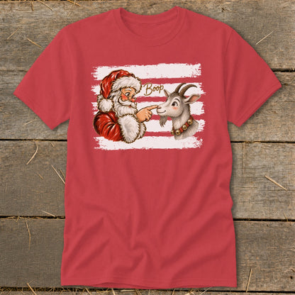 Santa booping a goat on the nose with the word "Boop"