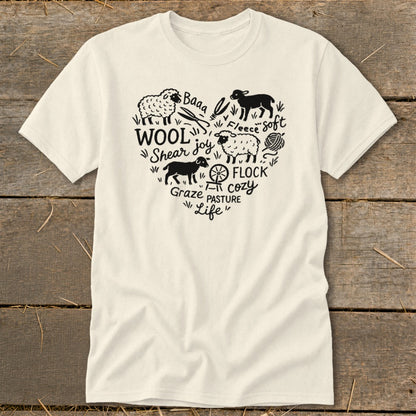 Cream t-shirt with black heart graphic of sheep, wool, and related text.