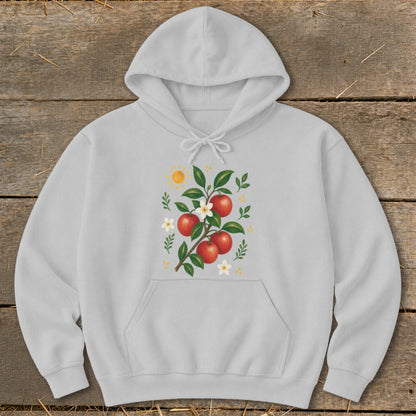Light grey hoodie with a whimsical apple branch illustration and a sun.