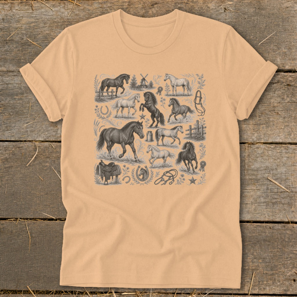 T-shirt with a repeating pattern of horses, saddles, and windmills in black and white.
