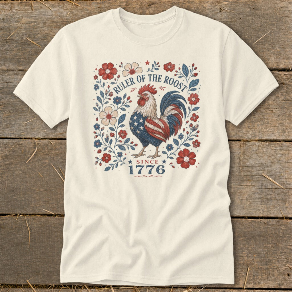 Cream t-shirt with a patriotic rooster design and "RULER OF THE ROOST SINCE 1776".