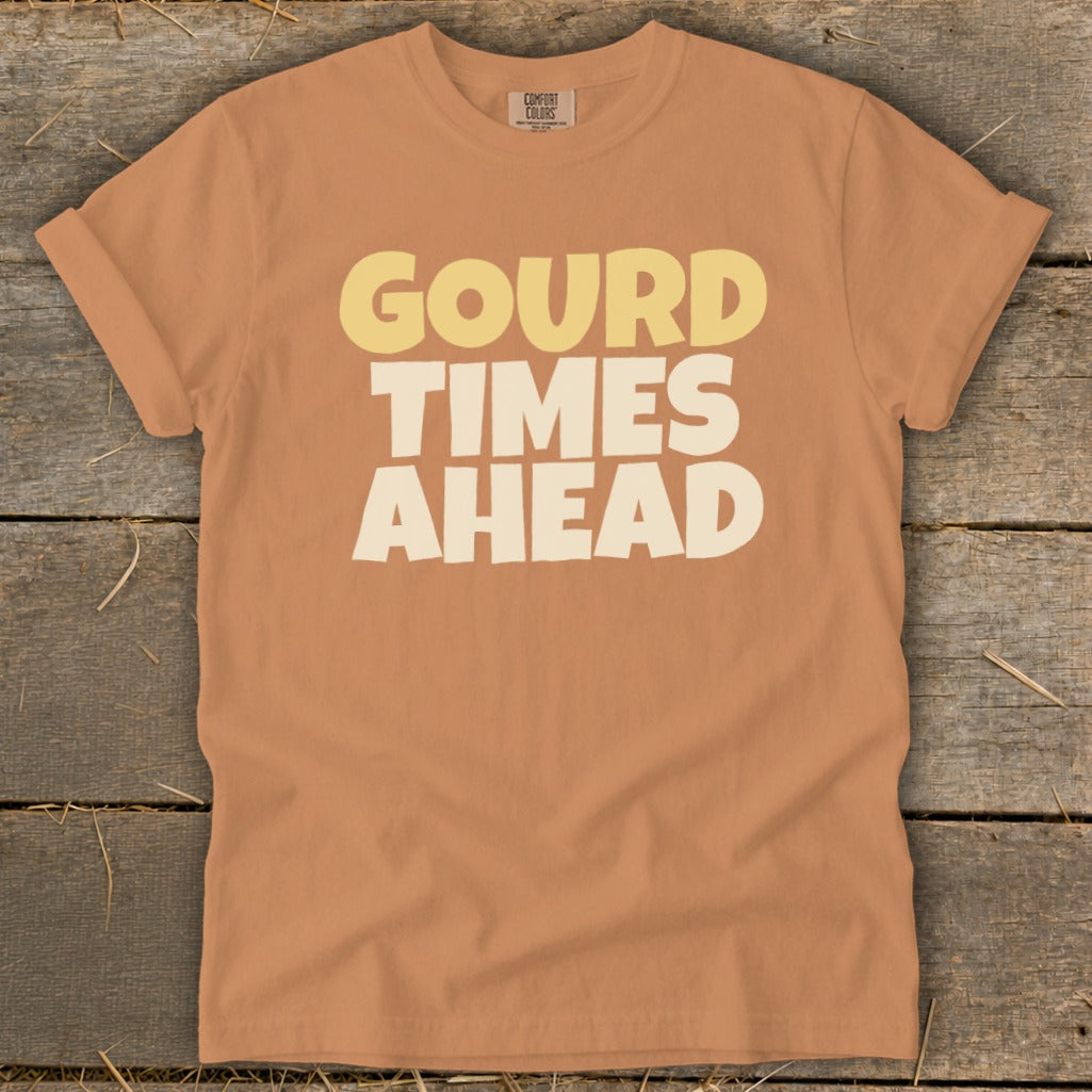 Orange t-shirt with "GOURD TIMES AHEAD" text.