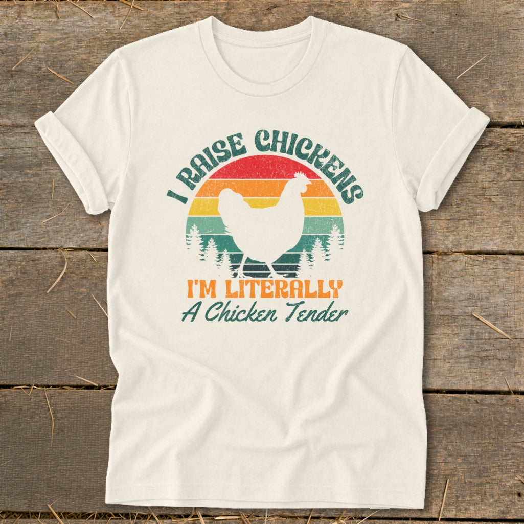 Cream t-shirt with retro sunset, chicken graphic and "I Raise Chickens I'm Literally A Chicken Tender" text.