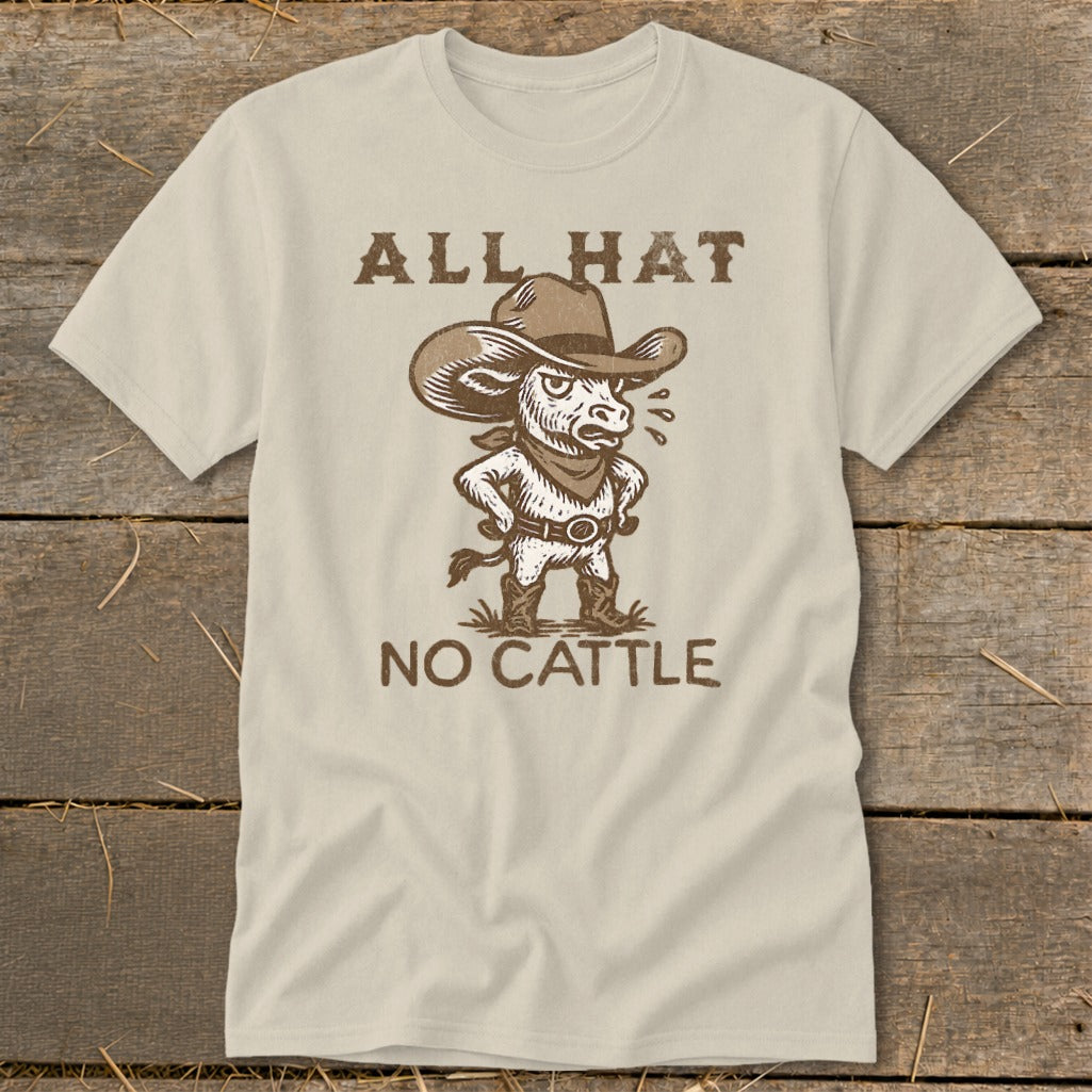 Light-colored t-shirt with brown graphic: "ALL HAT NO CATTLE" and a cowboy bull.
