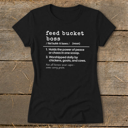 Black t-shirt with white text defining "feed bucket boss" and humorous descriptions.