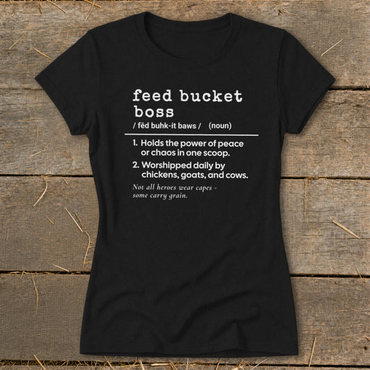 Black t-shirt with white text defining "feed bucket boss" and humorous descriptions.