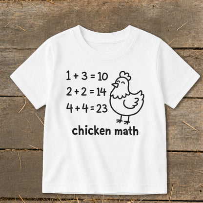 White t-shirt with "chicken math" text and cartoon chicken illustration.