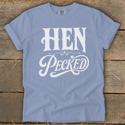 Light blue t-shirt with "HEN Pecked" white text design