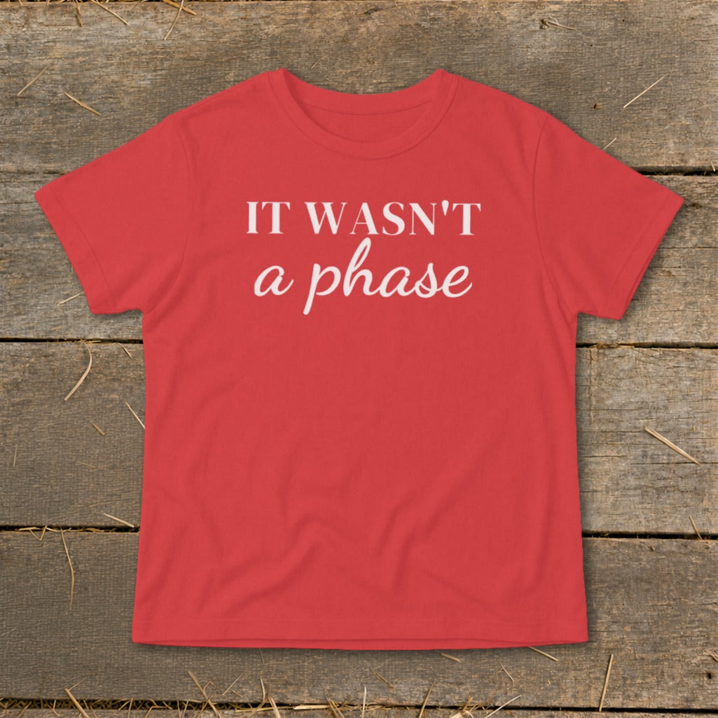 Red t-shirt with white text reading "IT WASN'T a phase".