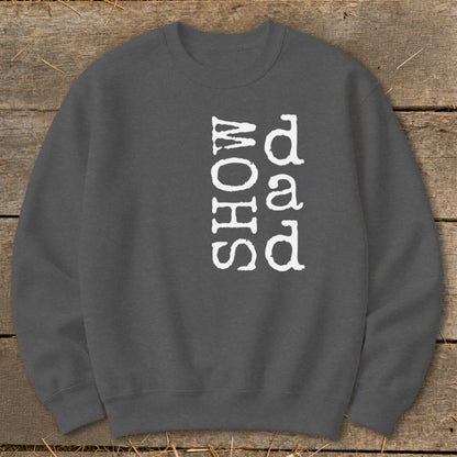 Dark gray sweatshirt with vertical white text reading "SHOW dad".