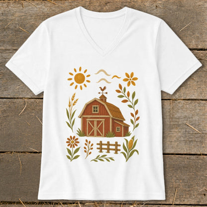 White v-neck t-shirt with a rustic farm scene graphic featuring a red barn.