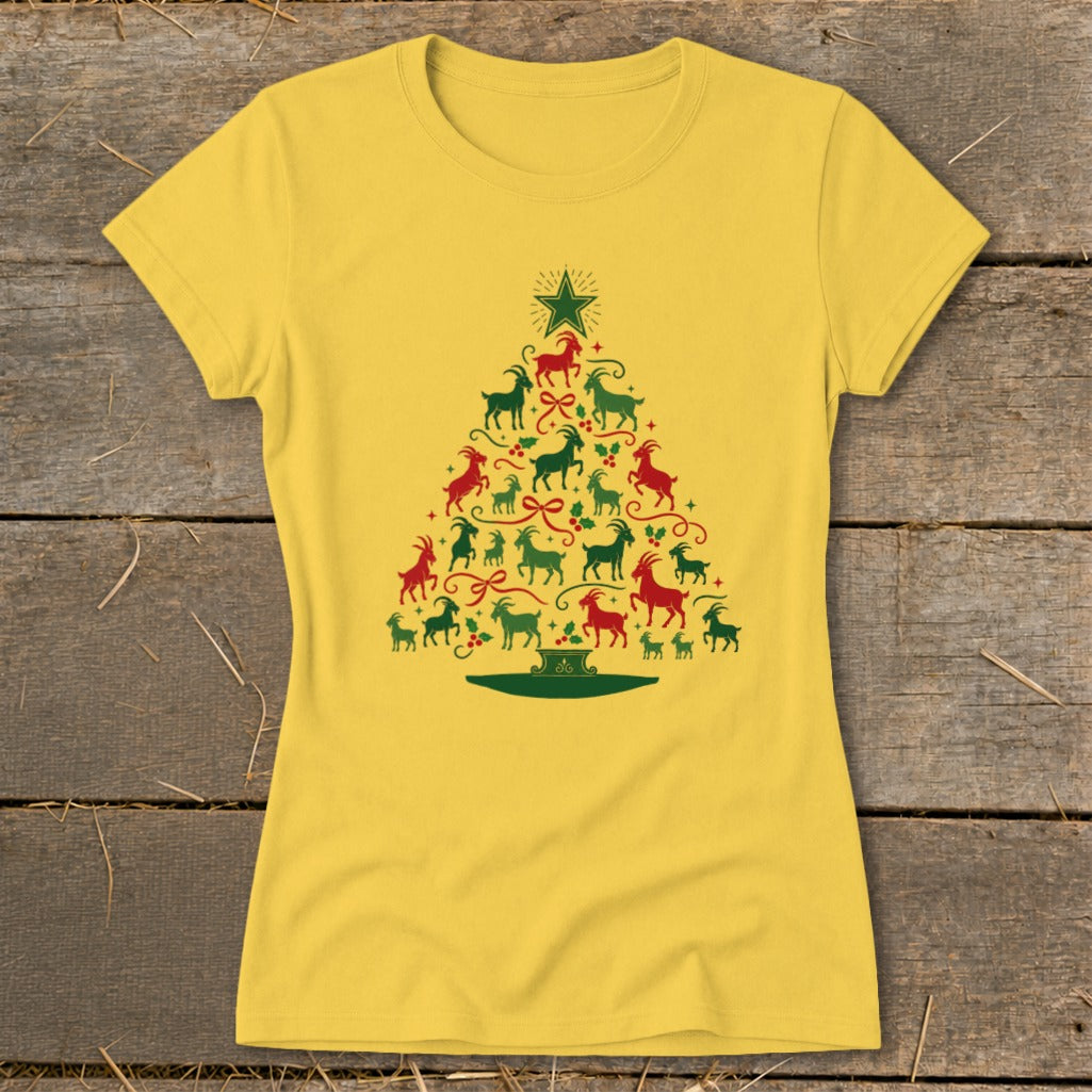 Yellow t-shirt with a Christmas tree made of red and green goats and holly sprigs.