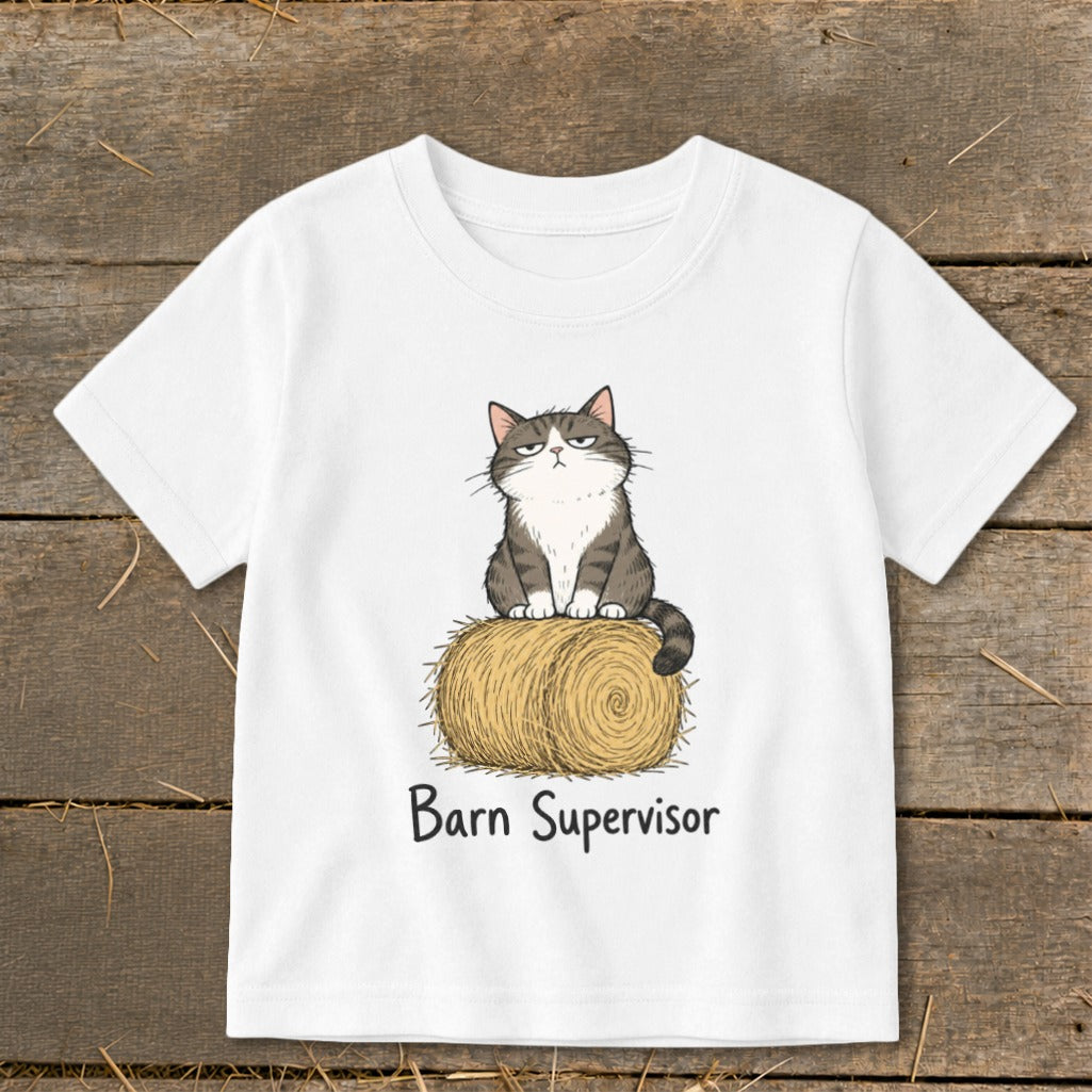 White t-shirt with a grumpy cat sitting on a hay bale, text reads "Barn Supervisor".
