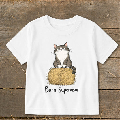 White t-shirt with a grumpy cat sitting on a hay bale, text reads "Barn Supervisor".