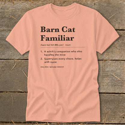 Peach t-shirt with "Barn Cat Familiar" definition: witch's companion, supervises chores.