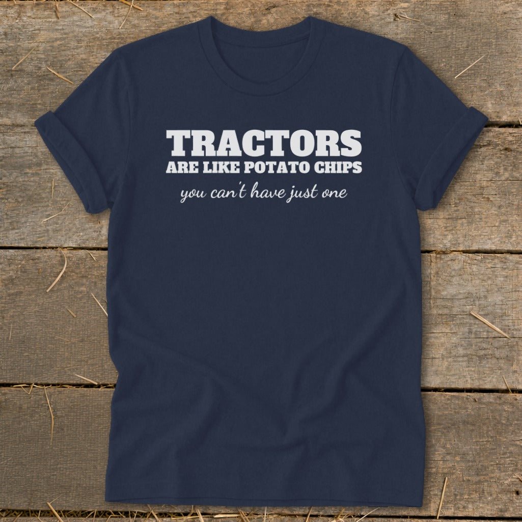 Navy t-shirt with white text that reads "TRACTORS ARE LIKE POTATO CHIPS you can't have just one".