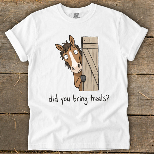 White t-shirt with cartoon horse peeking from a wooden door asking "did you bring treats?".