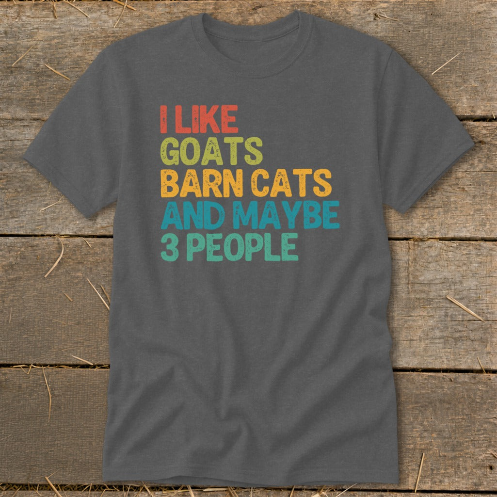 Dark gray t-shirt with text "I like goats, barn cats, and maybe 3 people."