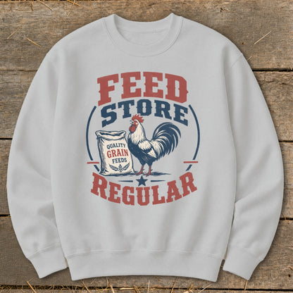 Light gray sweatshirt with "Feed Store Regular" text and rooster graphic.