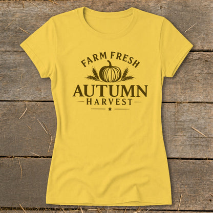 Yellow t-shirt with "Farm Fresh Autumn Harvest" text and pumpkin graphic.