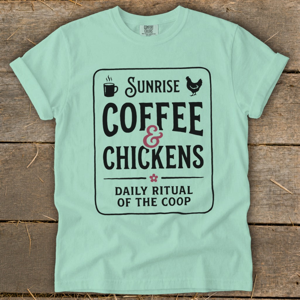 Mint green t-shirt with "Sunrise Coffee & Chickens Daily Ritual of the Coop" graphic.