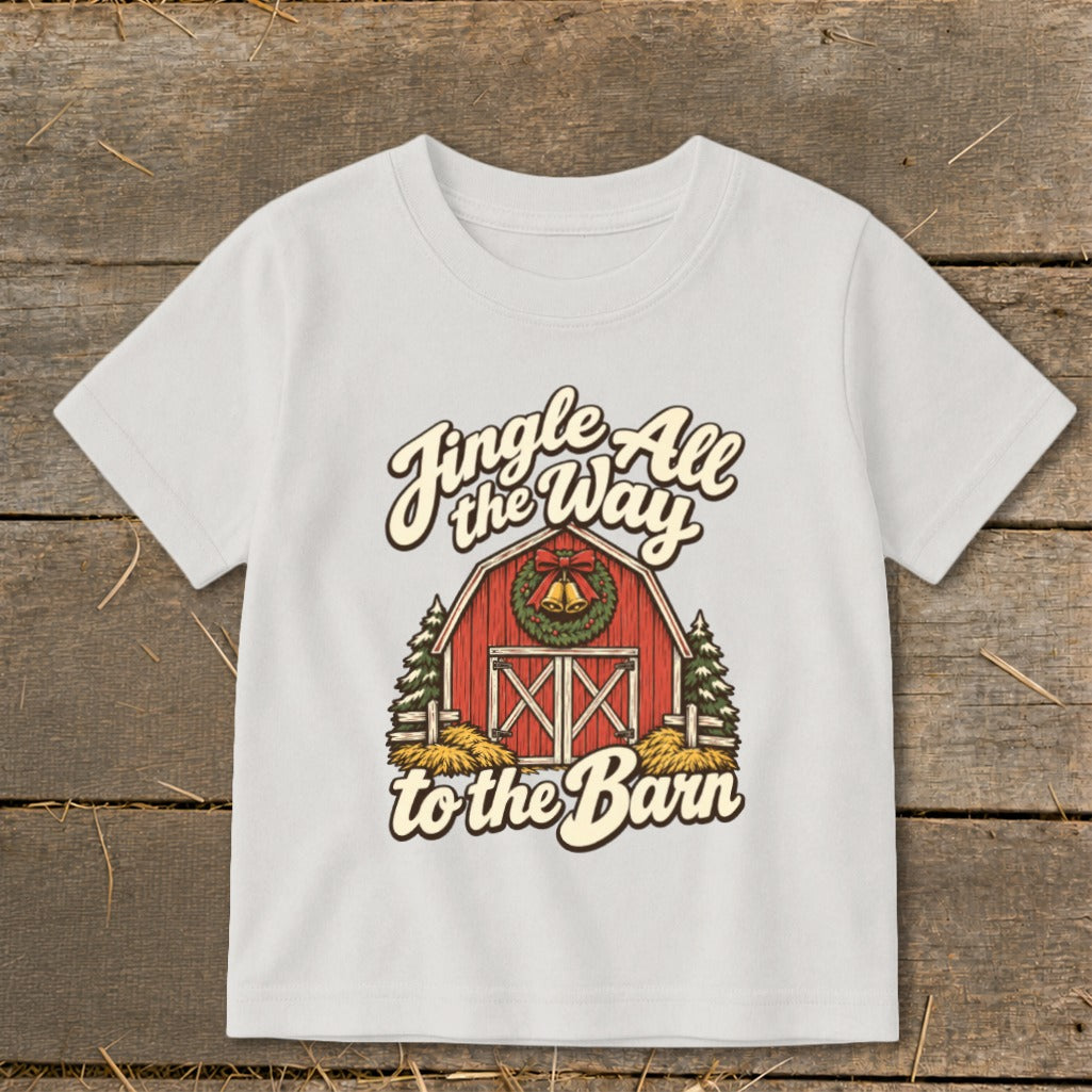 White t-shirt with "Jingle All the Way to the Barn" text and a festive barn graphic.