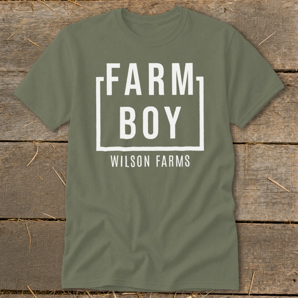 Olive green t-shirt with "FARM BOY WILSON FARMS" graphic in white.