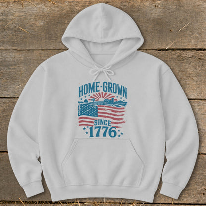 White hoodie with "HOME GROWN SINCE 1776" text and American flag graphic.