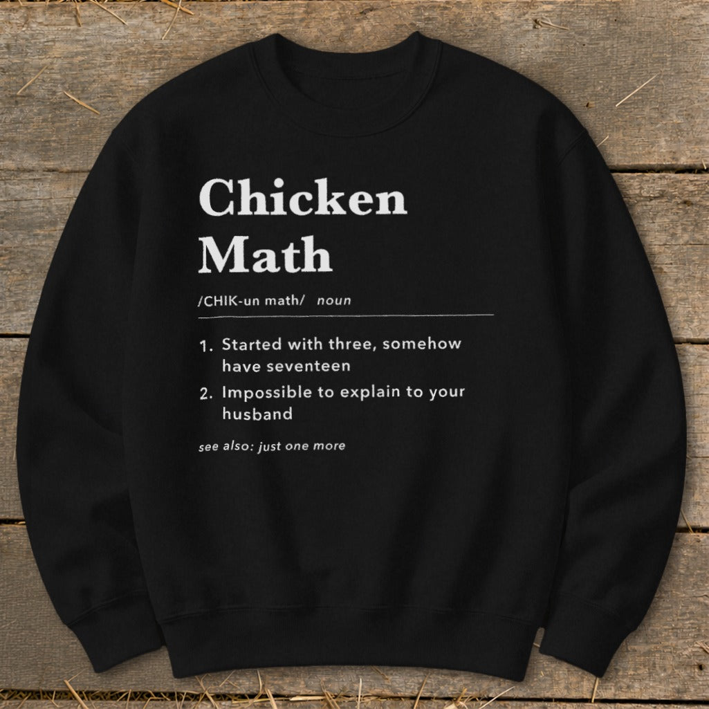 Black sweatshirt with "Chicken Math" definition and humorous explanations.