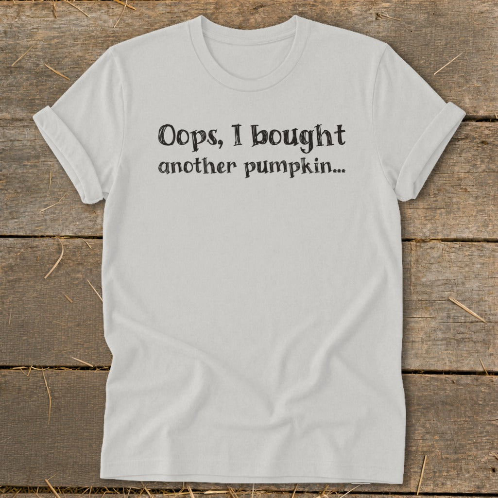 White t-shirt with black text "Oops, I bought another pumpkin..."
