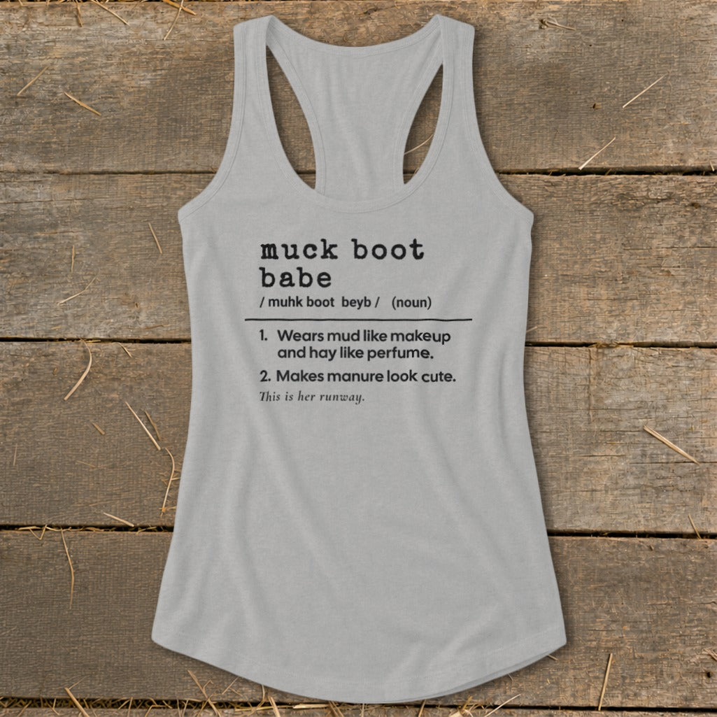 Grey tank top with "muck boot babe" definition printed on it.