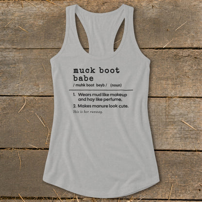 Grey tank top with "muck boot babe" definition printed on it.